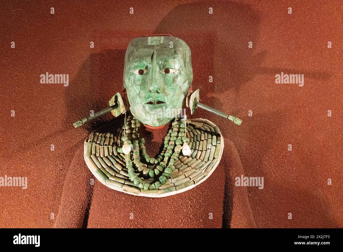 Jade death mask and other effects of Pakal the Great aka Pacal, Mayan King 603-683 AD; originally interred at Palenque, Mexico. Maya artifacts, Stock Photo