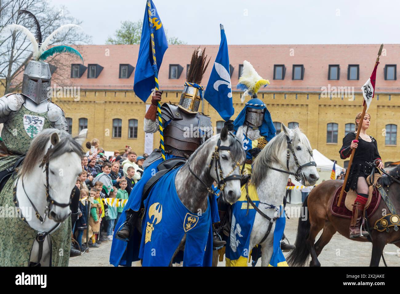 Berlin, Germany - 30 March, 2024: Medieval Fair: Easter Knight Spectaculum. Medieval festival with shows in Spandau. Knight. The knight catches the ri Stock Photo
