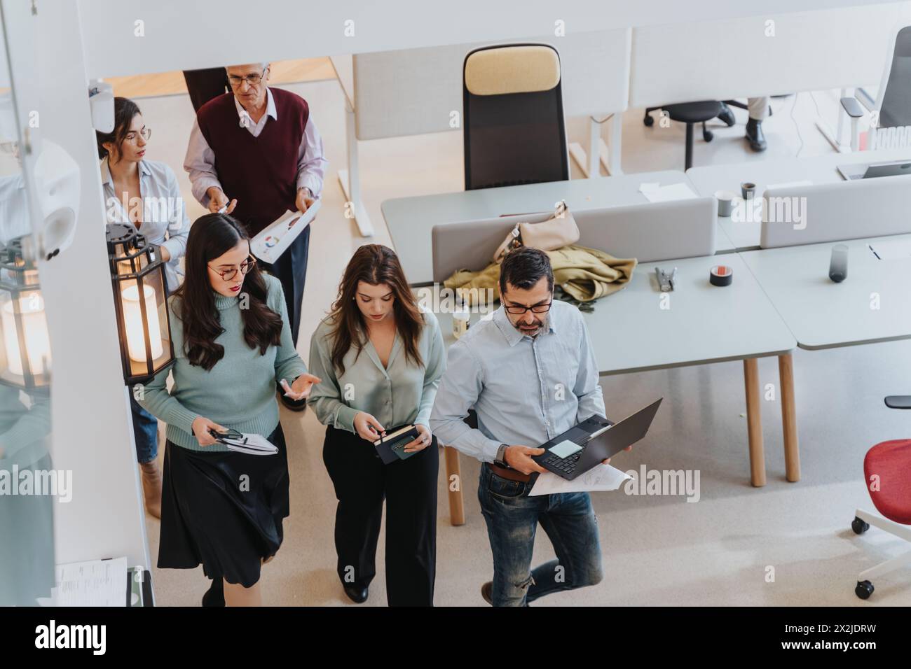 Diverse colleagues walking work hi-res stock photography and images - Alamy