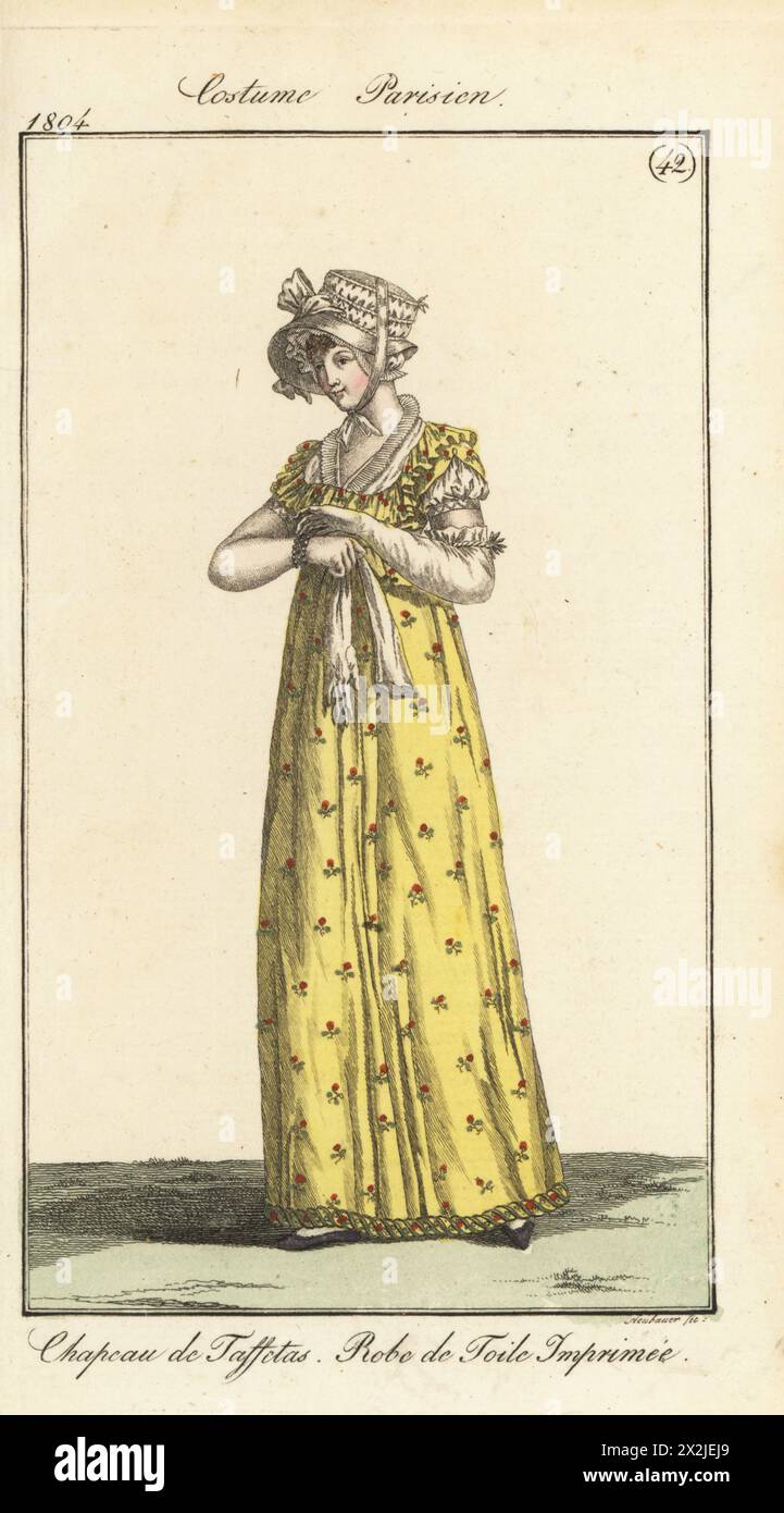 French woman in taffeta bonnet, yellow floral-print gown with Turkish trim. Chapeau de taffetas. Robe de toile imprimee. Pl. 582 in the Paris edition. Handcoloured copperplate engraving by Friedrich Ludwig Neubauer from Pierre de la Messengere’s Journal des Dames et des Modes, Francfort sur le Mein (Frankfurt) 1804. After illustrations by Carle Vernet, Jean-Francois Bosio, Dominique Bosio and Philibert Louis Debucourt. Stock Photo