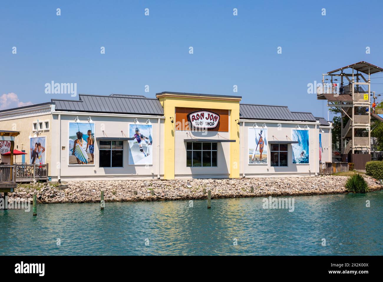 The Ron Jon Surf Shop sits on the Lake Broadway waterfront at Broadway at the Beach in Myrtle Beach, South Carolina, USA. Stock Photo