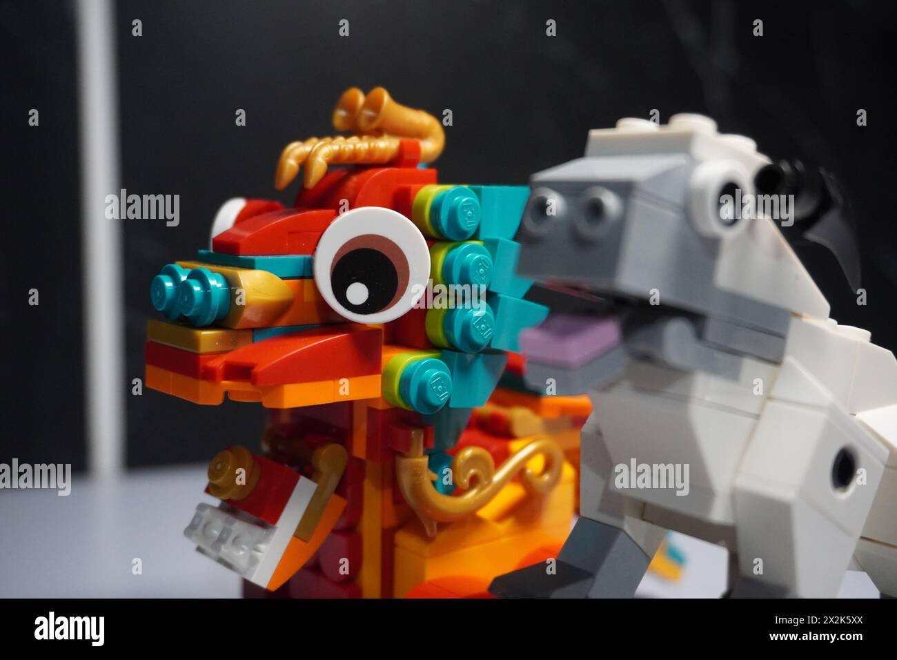 Lego in the form of a dragon and a sheep representing the zodiac signs Stock Photo