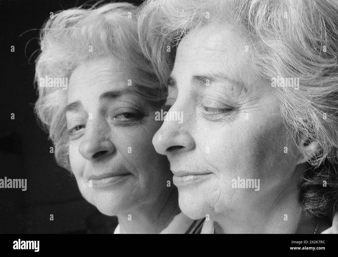 Mature woman's face. Mirrored image. Black and White Stock Photo Alamy