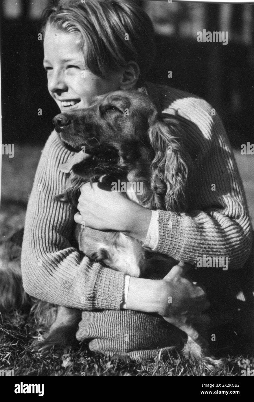 Schmoelcke, Werner, German photographer, as child with dog, circa 1930, ADDITIONAL-RIGHTS-CLEARANCE-INFO-NOT-AVAILABLE Stock Photo