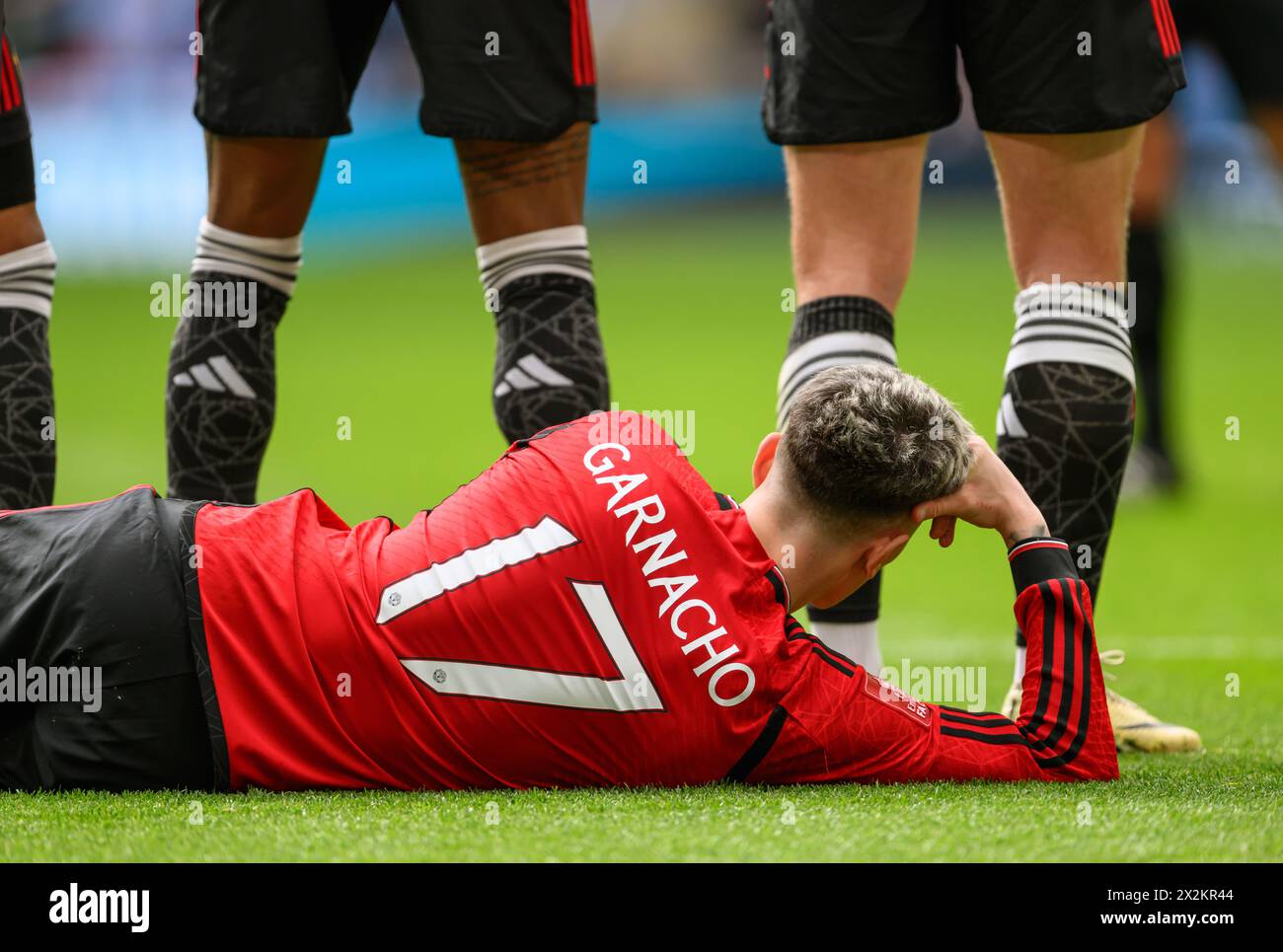 London, UK. 21st Apr, 2024 - Manchester United v Coventry City - FA Cup Semi-Final - Wembley.                                                                Manchester United's Alejandro Garnacho lies down in his role as a ' draft excluder' behind a defensive wall.                                        Picture Credit: Mark Pain / Alamy Live News Stock Photo