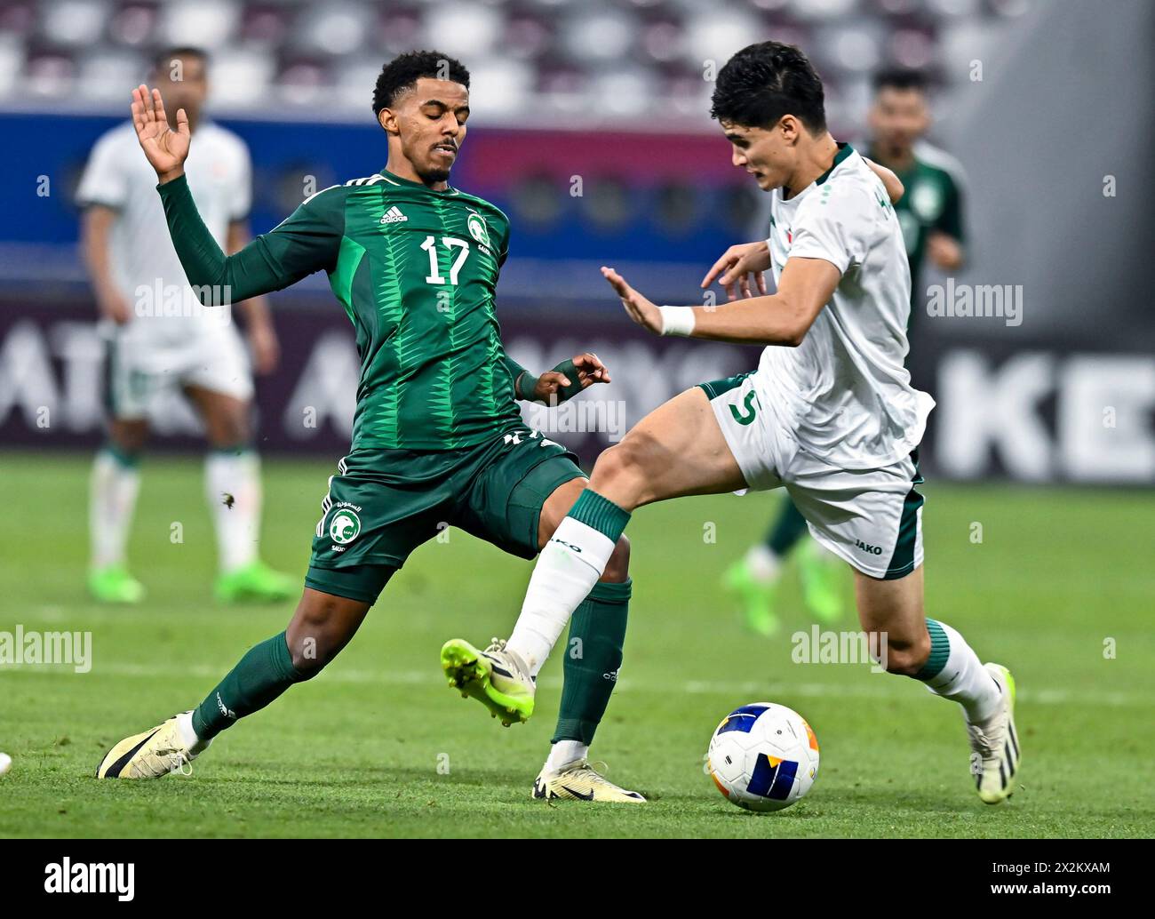 Doha, Qatar. 22nd Apr, 2024. Haitham Mohammed Asiri (L) of Saudi Arabia ...