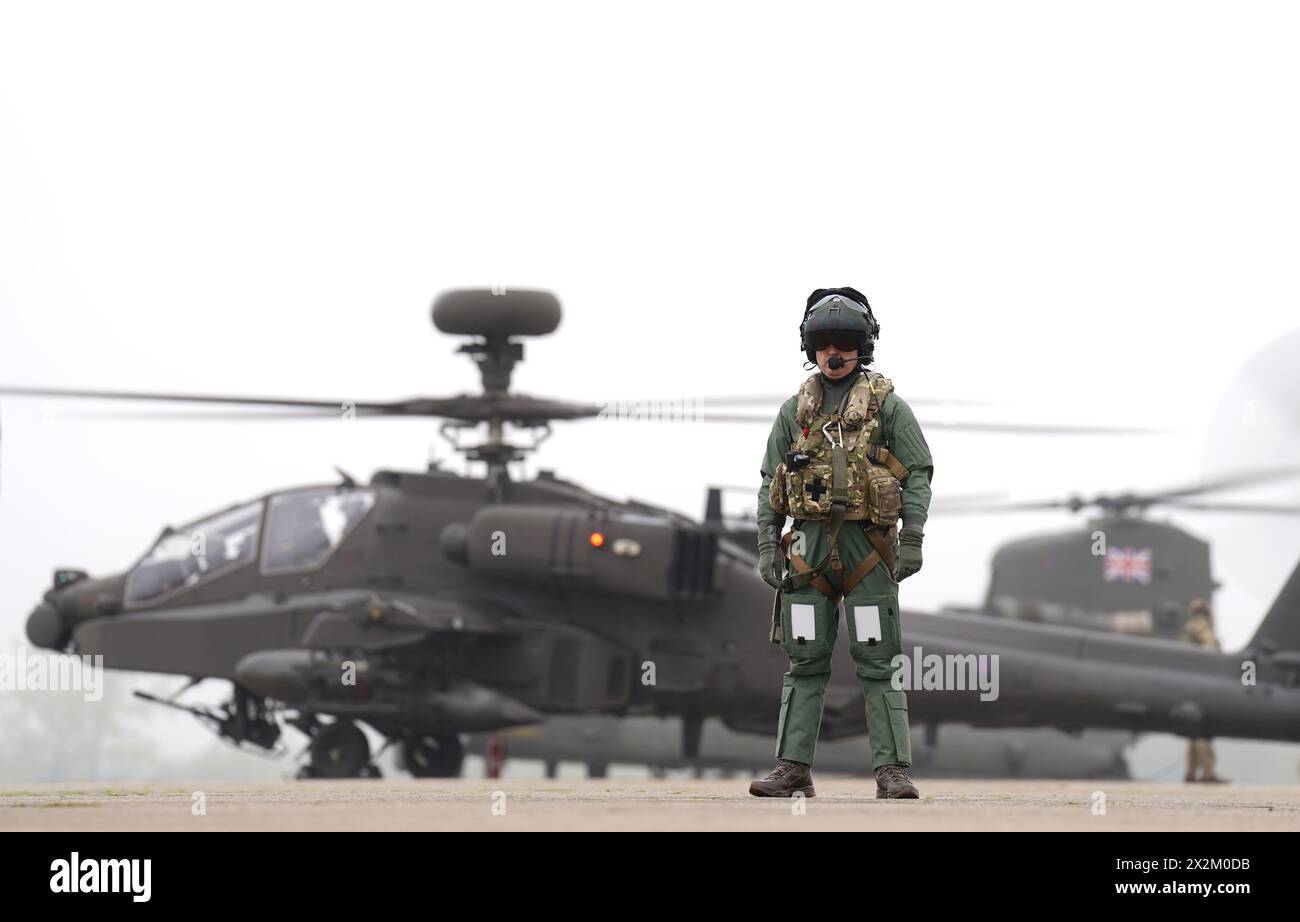 British Army Apache AH-64E attack helicopters are prepared for take off ...