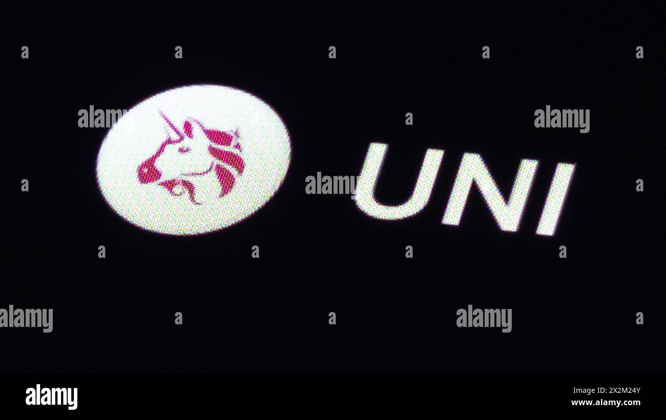 Uniswap UNI cryptocurrency logo on the screen of a smartphone in mans hand  with a growing trend on the chart on a green background Stock Photo - Alamy