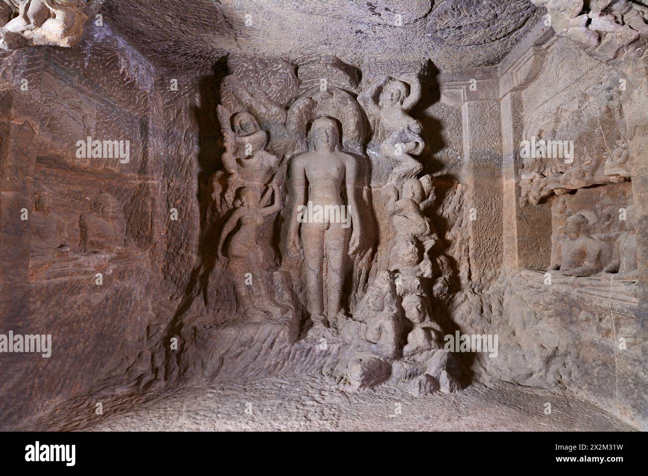 Ellora Jain Caves: Cave No 33 Kamatha's attack on Parsvanatha, Left wall of the mandapa. Stock Photo