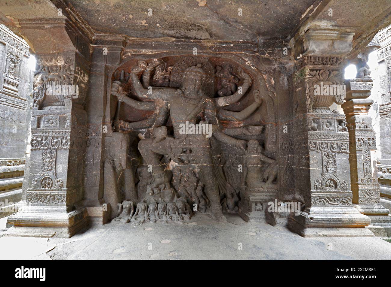 Ellora Brahmanical Caves: Kailas a No 16 Siva Killing the demon Andhaka at the entrance to the Kailas a temple complex. Stock Photo