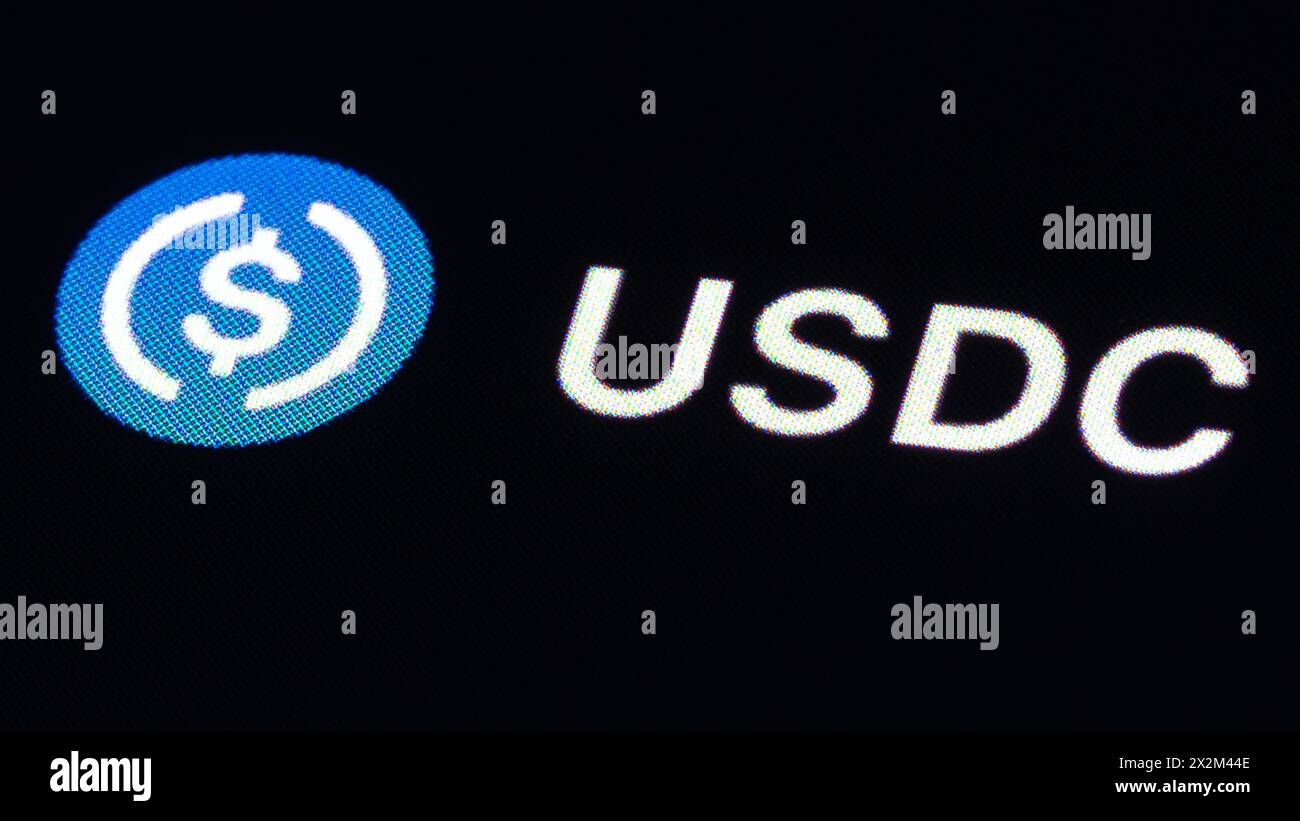 Rottweil, Germany. 23rd Apr, 2024. The logo of the stablecoin USD Coin (USDC) can be seen on the CoinMarcetCap trading platform. Credit: Silas Stein/dpa/Alamy Live News Stock Photo