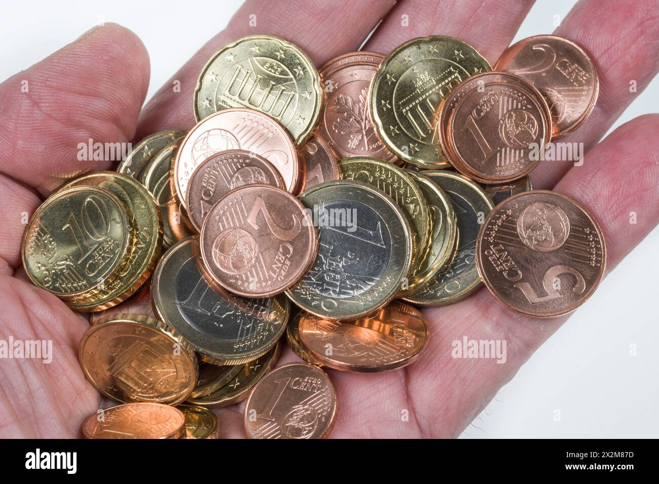 Geld, Hand, Münzen, Euro, Cent, Symbolfoto Geld, Reichtum, Konjunktur, Gehalt, Bestechung Stock Photo