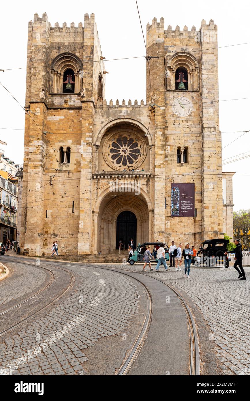 Romanesque façade of the Lisbon Cathedral, Lisbon, Portugal. The Cathedral of Saint Mary Major is the oldest church in the city. Built in 1147, the ca Stock Photo