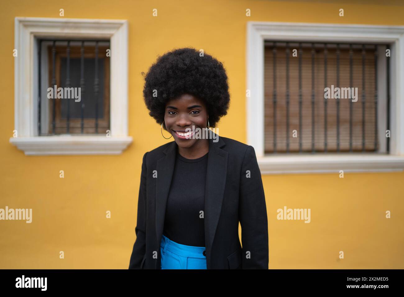 Radiant young woman afro hi-res stock photography and images - Alamy
