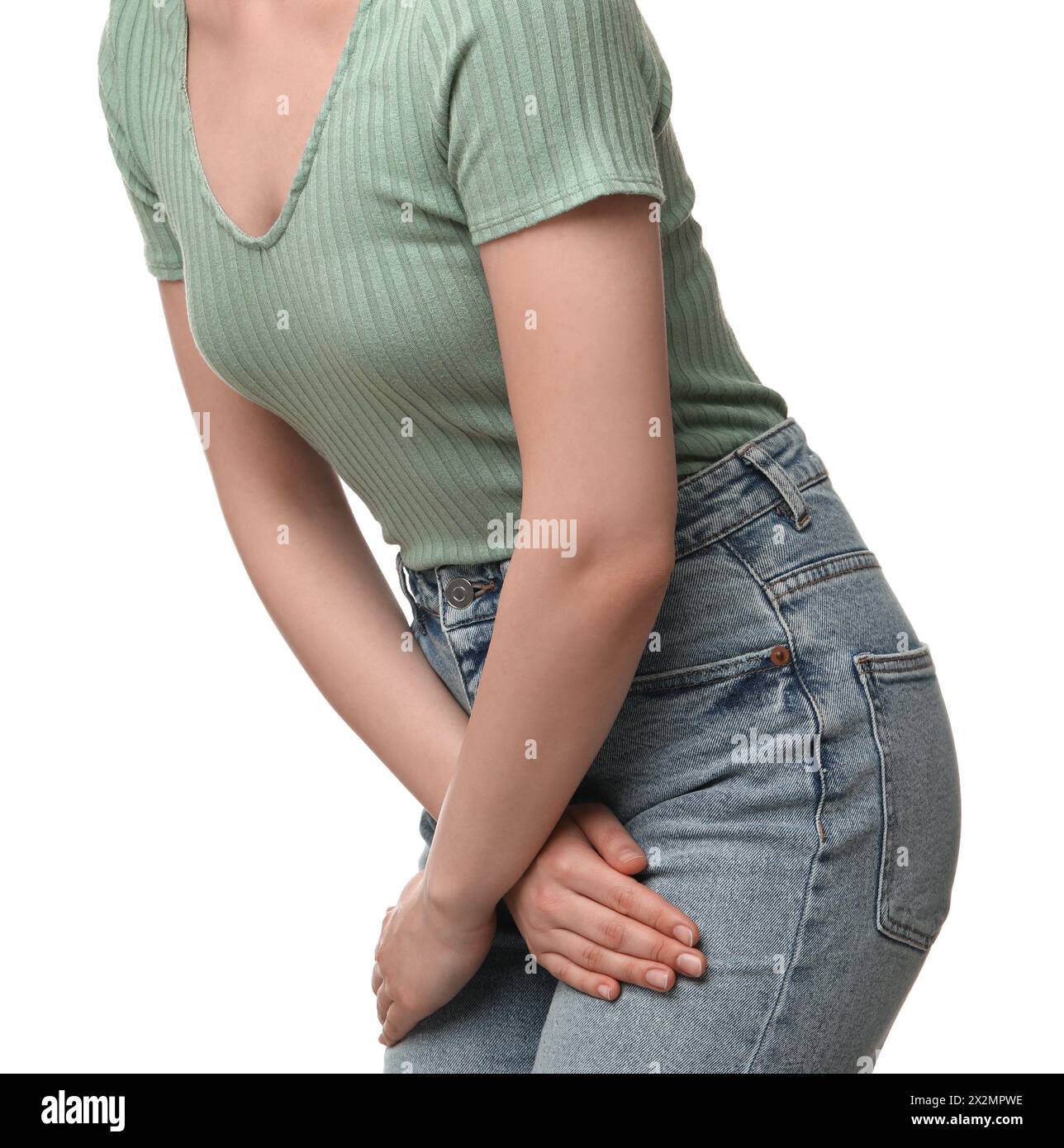 Woman suffering from cystitis on white background, closeup Stock Photo