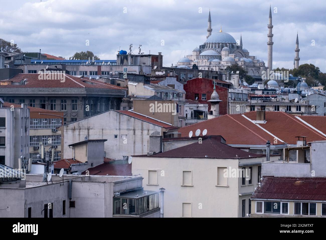 A cityscape of residential buildings and the Suleymaniye Mosque in Istanbul, Turkey's largest city on the Bosphorus strait in the Marmara region, on 1 Stock Photo
