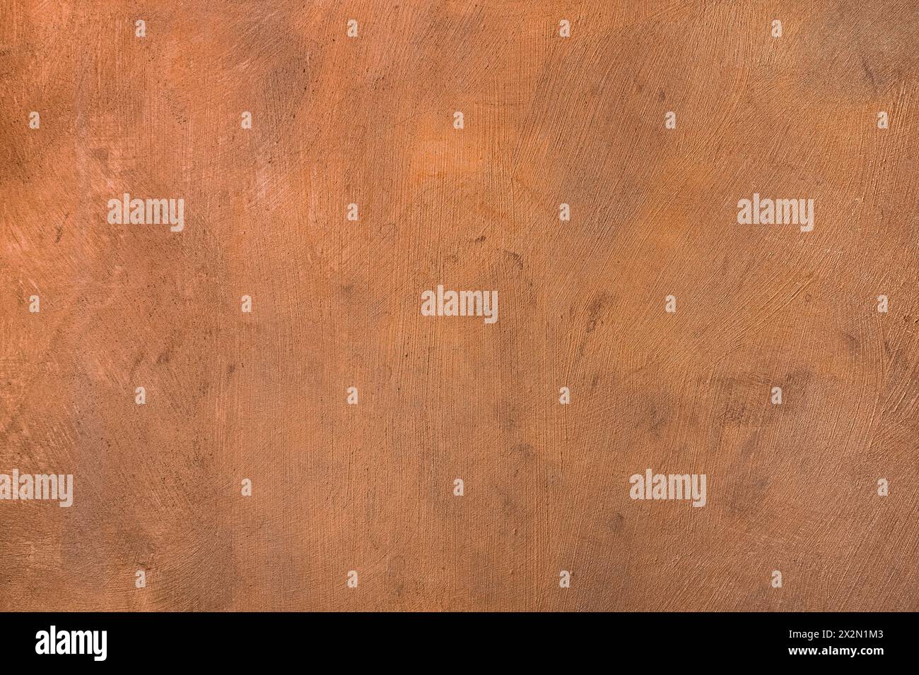Copper coloured painted surface with metallic enamel and visible brush strokes Stock Photo