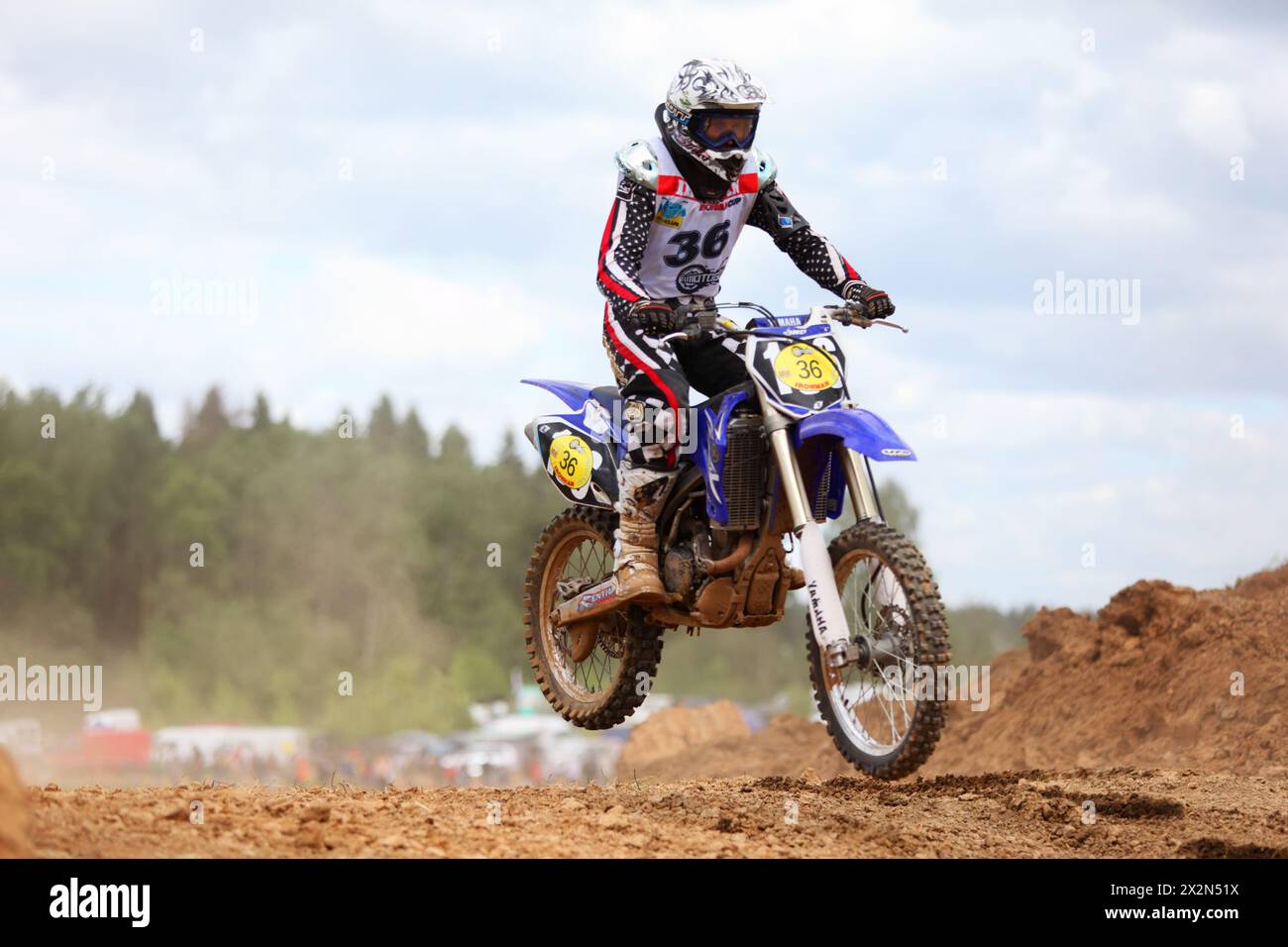 RAKOVO - JUNE 4: Motor-cyclist at first stage of race in enduro-cross series IronManmotorcycling at X-ARENA on June 4, 2011 in Rakovo village near Mos Stock Photo