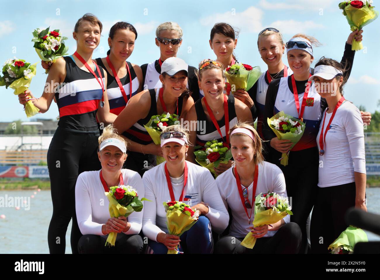 MOSCOW  - JUNE 5: Russian women team rowing at Great Moscow Regatta 2011 on June 5, 2011 in Moscow, Russia. Stock Photo