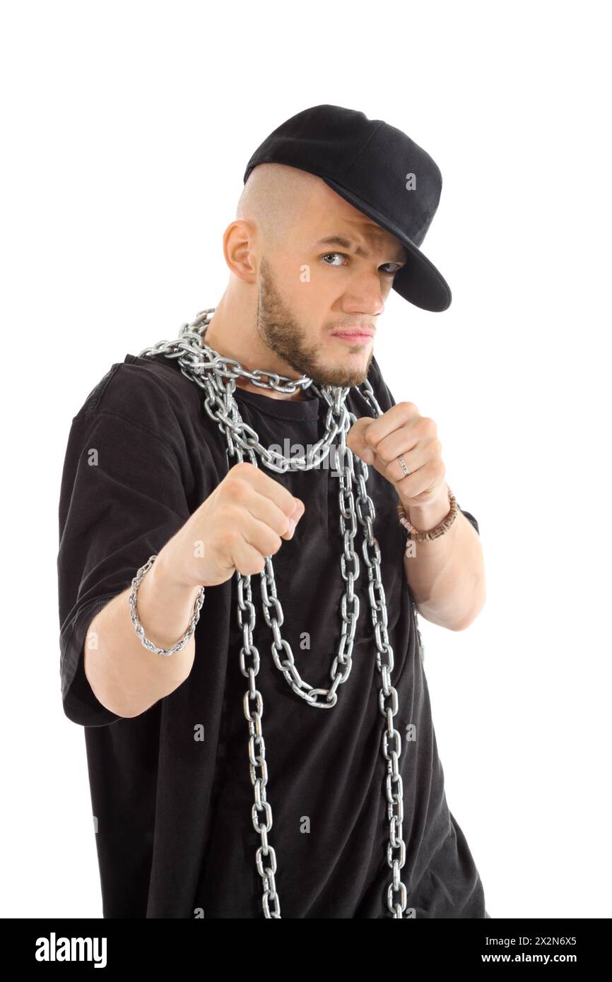 Rapper wearing black t-shirt with big chain at neck ready for fight isolated on white background. Stock Photo