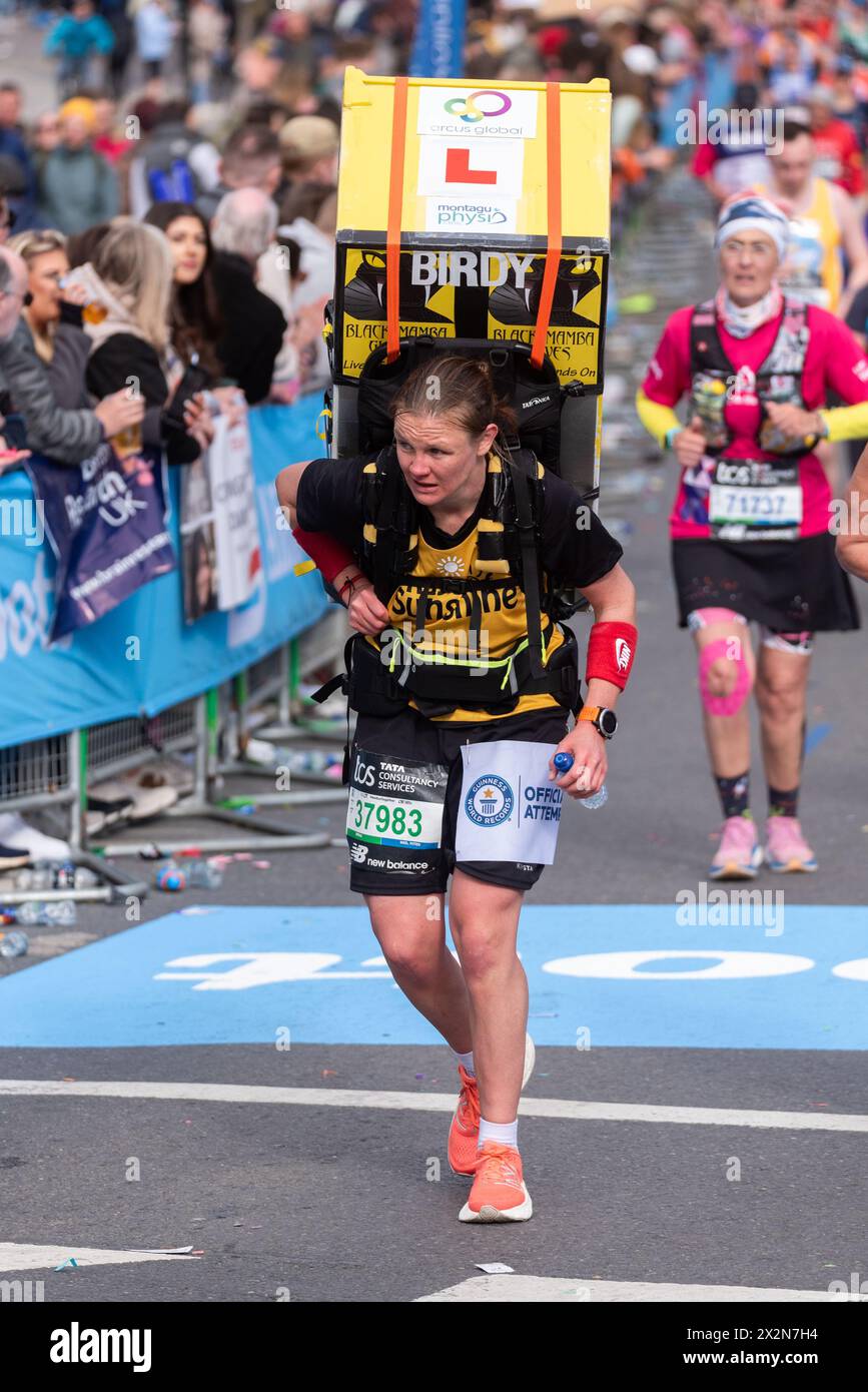 Laura Bird participating in the TCS London Marathon 2024 passing