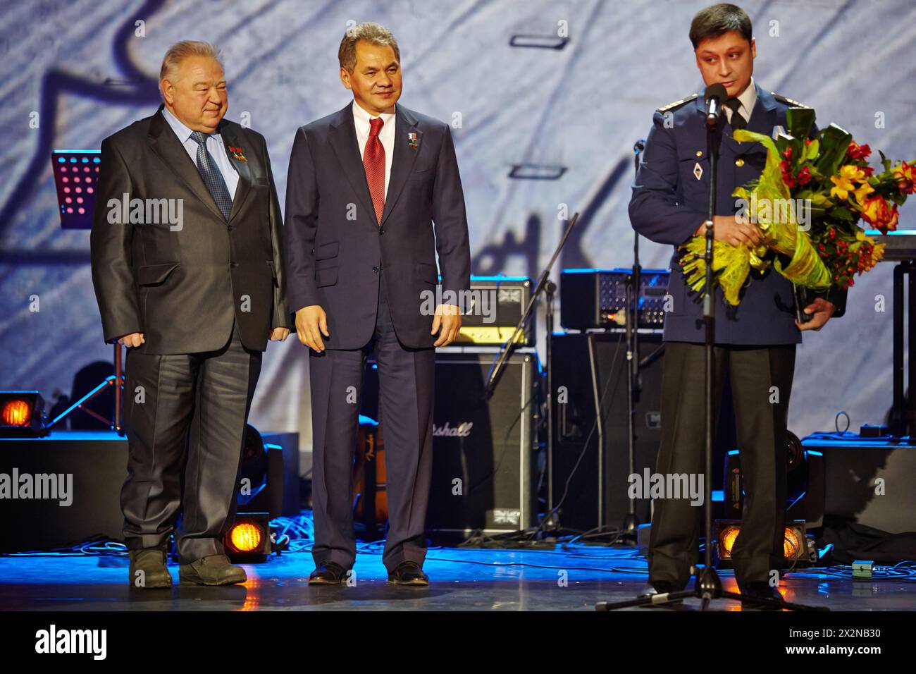 MOSCOW - JAN 23: Pilot-cosmonaut Georgy Grechko, Minister of Defence of Russia Sergei Shoigu, and ship Arabella captain Roman Lizalin at award ceremon Stock Photo