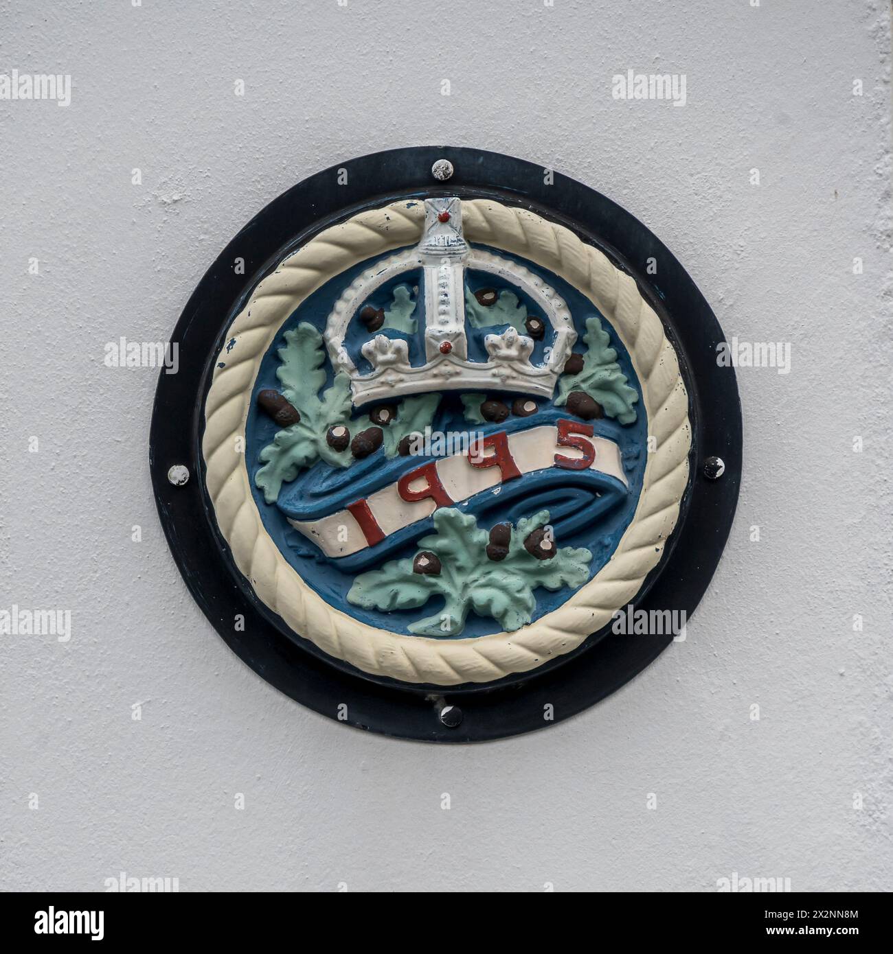 The image is of various insignia at the RNLI lifeboat station at the coastal resort town of Port Erin on the southwestern tip of the Isle of Man Stock Photo