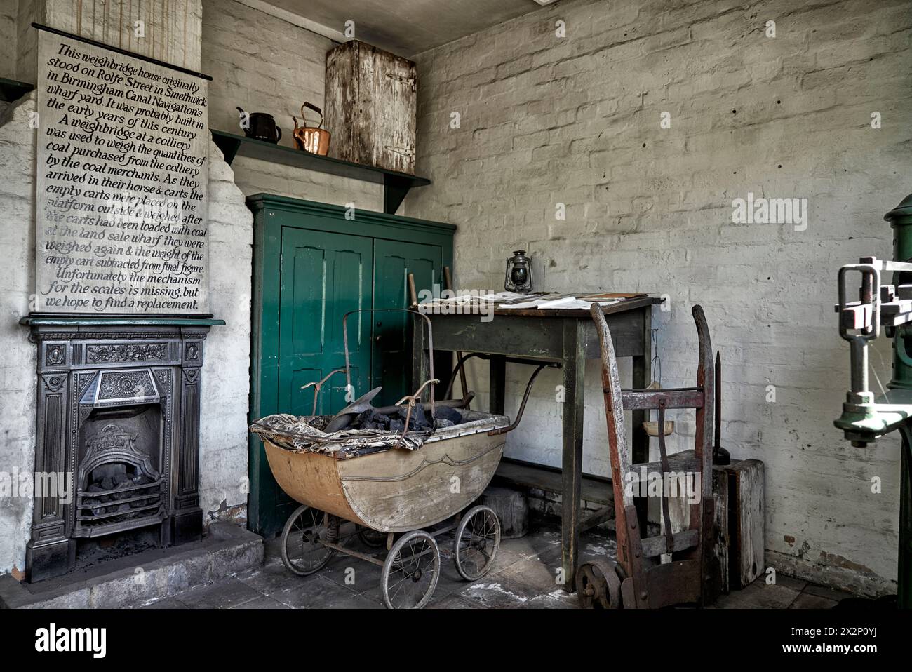 Black Country Museum. Fireplace and items in a preserved 1800's early 1900's cottage type home  Dudley England UK Stock Photo