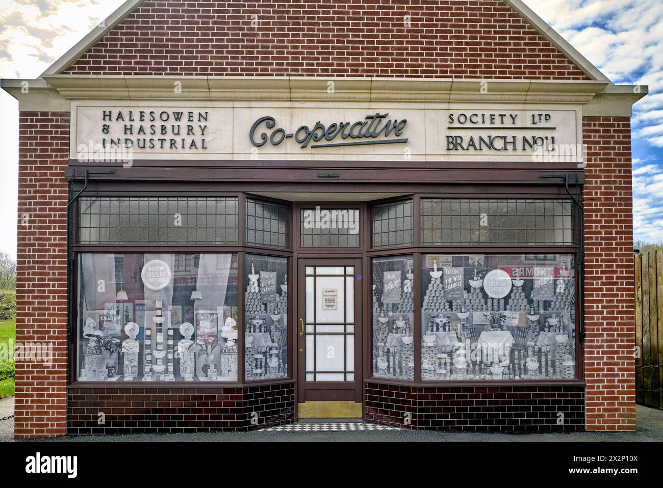 Vintage Co-op store frontage. Exterior of a 1900s co-operative store. England UK Stock Photo