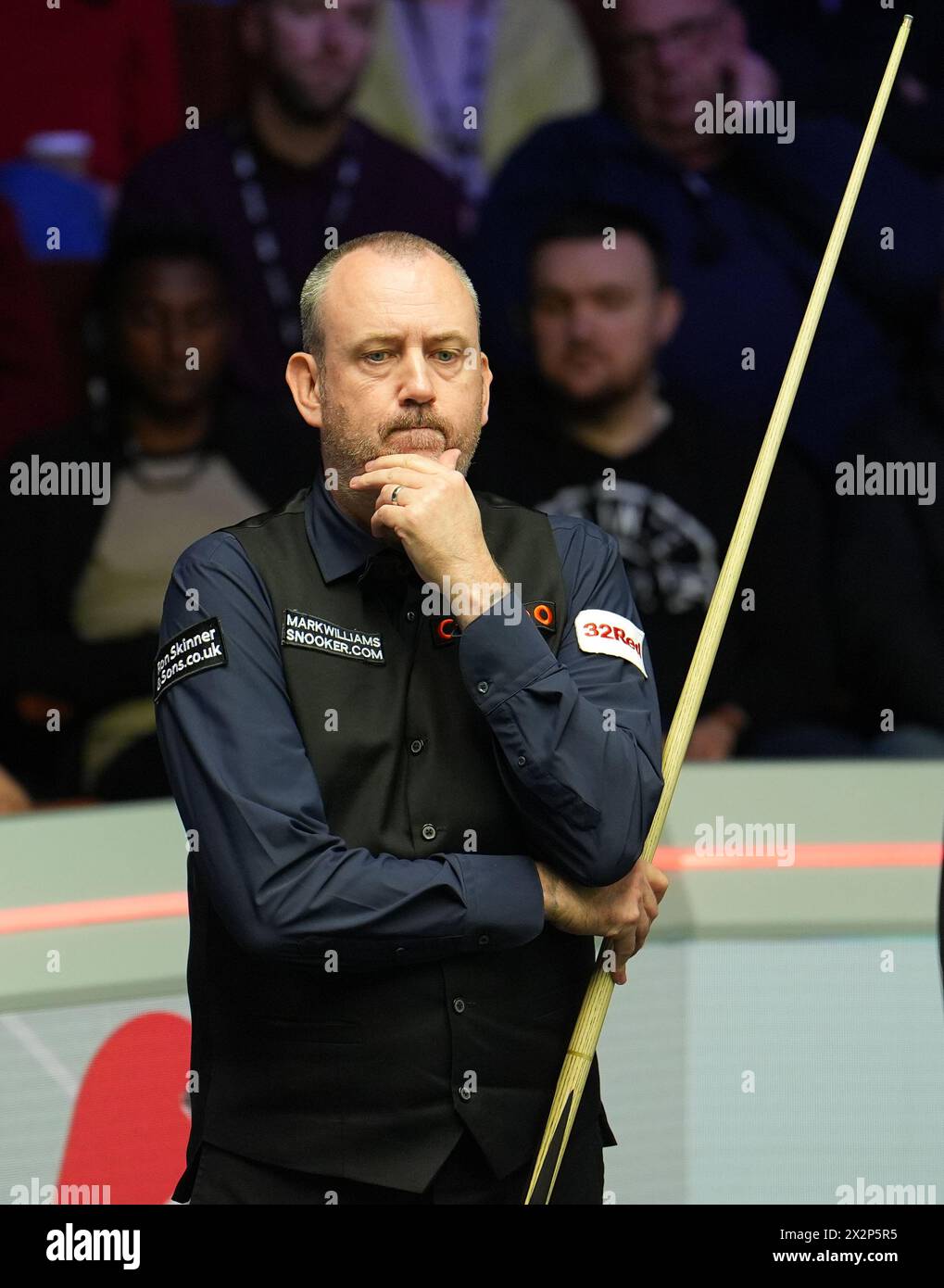 Mark Williams reacts on day four of the 2024 Cazoo World Snooker