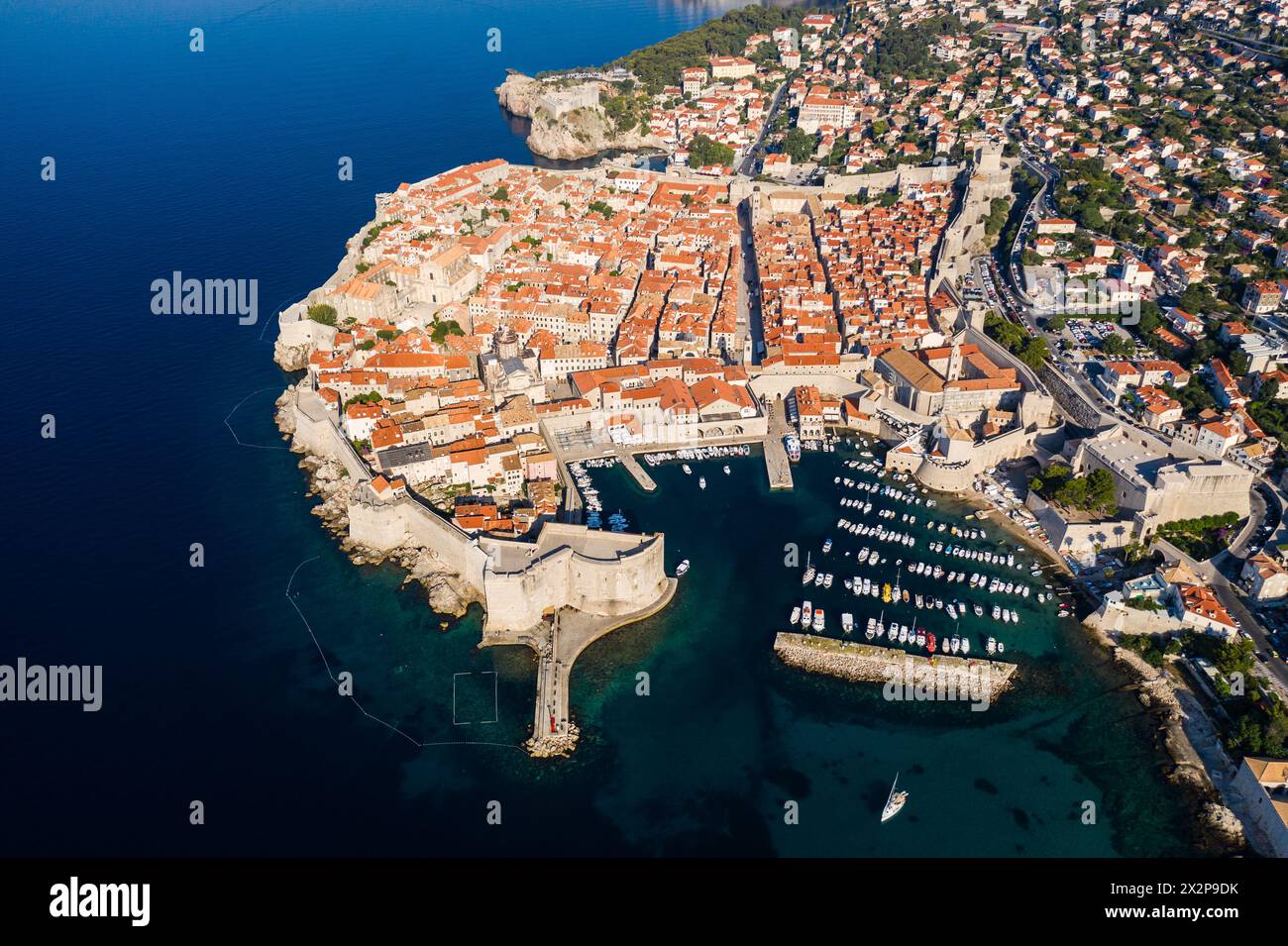 Dubrovnik, Croatia: Aerial of the famous Dubrovnik medieval old town port and The Cathedral of the Assumption of the Virgin Mar  by the Adriatic sea o Stock Photo