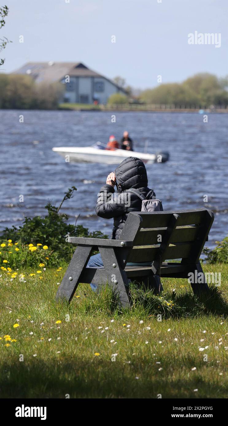 Kinnego, Lough Neagh, County Armagh, Northern Ireland, UK. 23rd Apr 2024. UK weather - a bright sunny day on the shore of Lough Neagh at Kinnego but cold in the northerly breeze. Credit: CAZIMB/Alamy Live News. Stock Photo