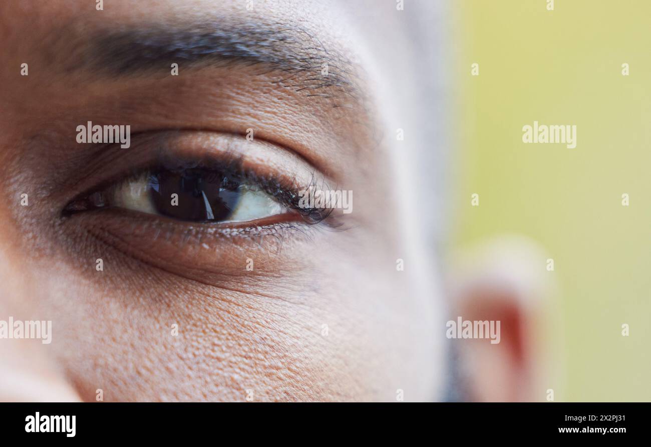 Portrait, close up and eye for vision with man, mental health and sad with paramedic for trauma in career. Loss, perception and guilt, zoom and Stock Photo