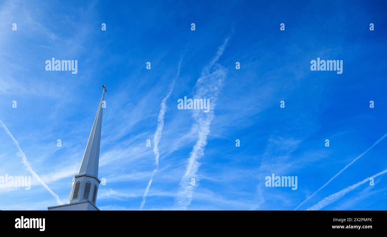 Jet contrails decorate a winter sky in North Central Florida. Stock Photo