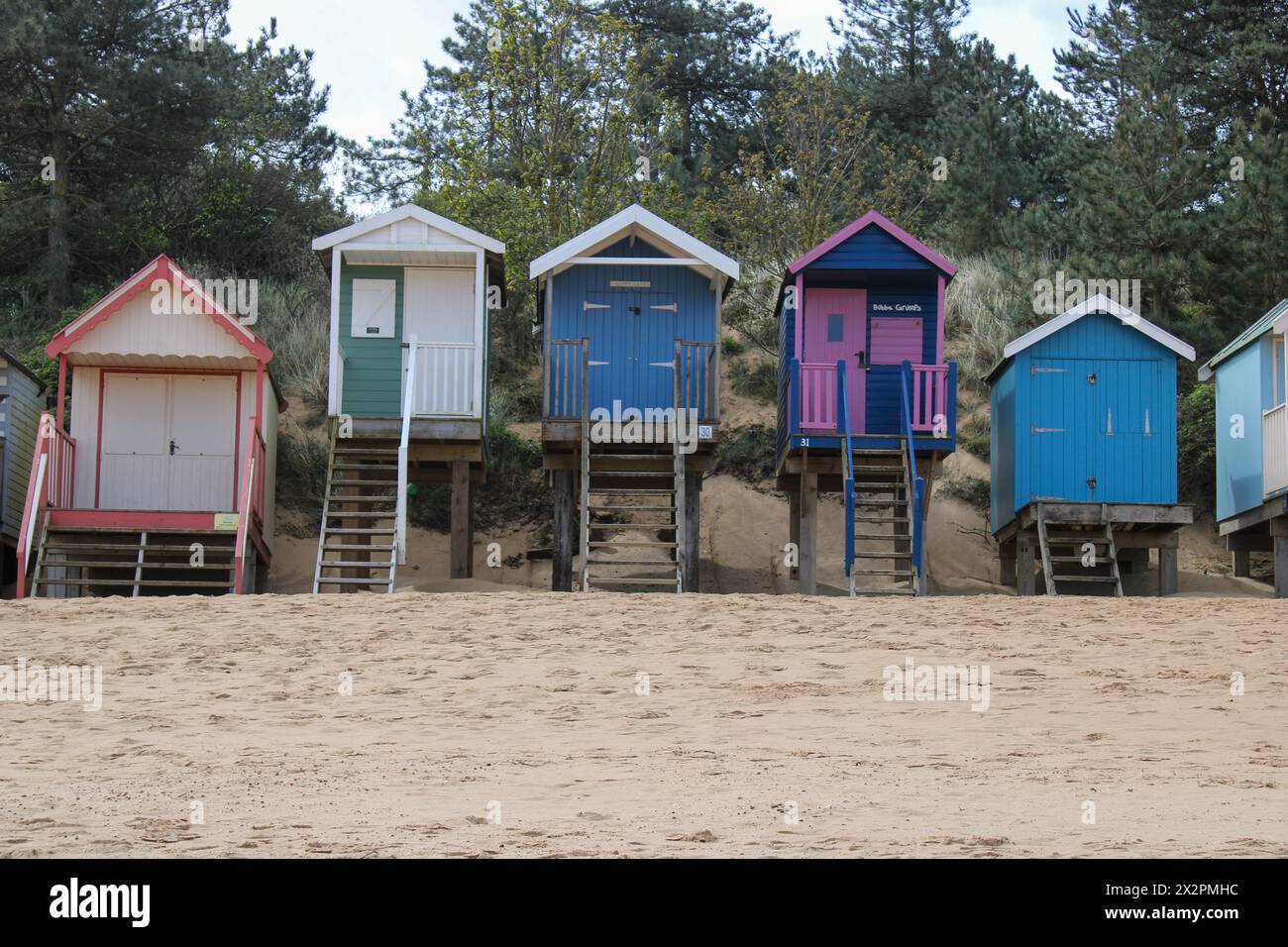 Beach huts on the seafront at Wells next the sea, Norfolk, UK Stock Photo