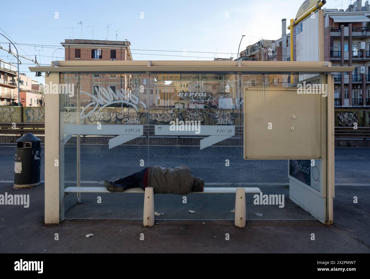 Homeless Bus Stop Homelessness poor poverty sleep hi-res stock photography and images - Alamy