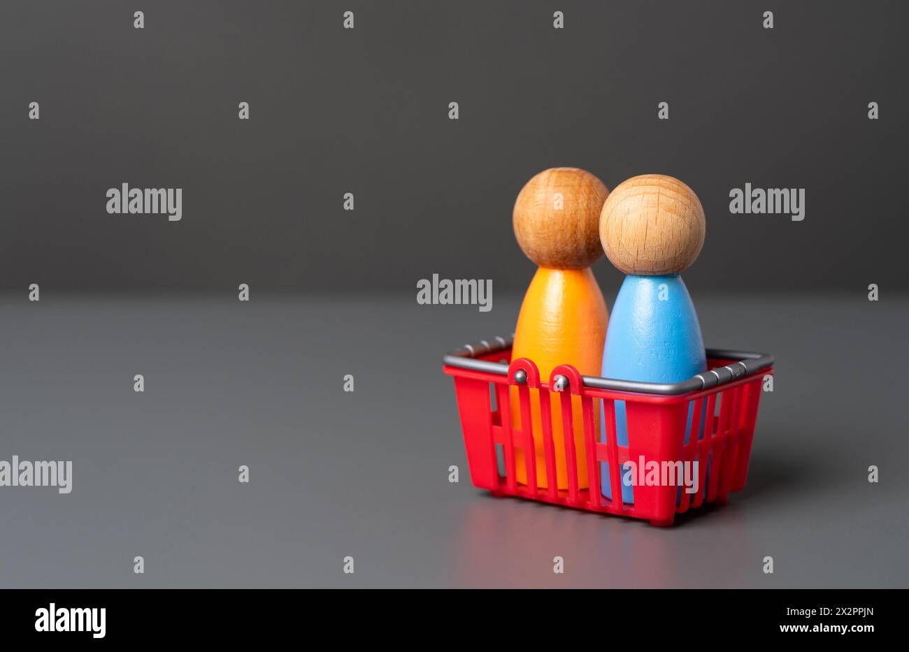 Customers in a shopping basket. Buyer preferences. Market basket research. Gain insight into the hearts and minds of consumers. Products and marketing Stock Photo