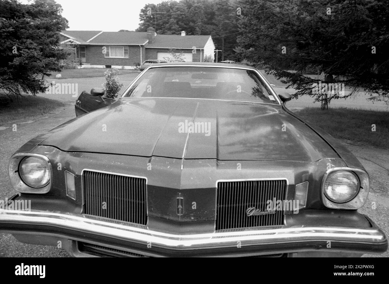 Connecticut, U.S.A., 1982. An Oldsmobile vehicle in a driveway. Stock Photo