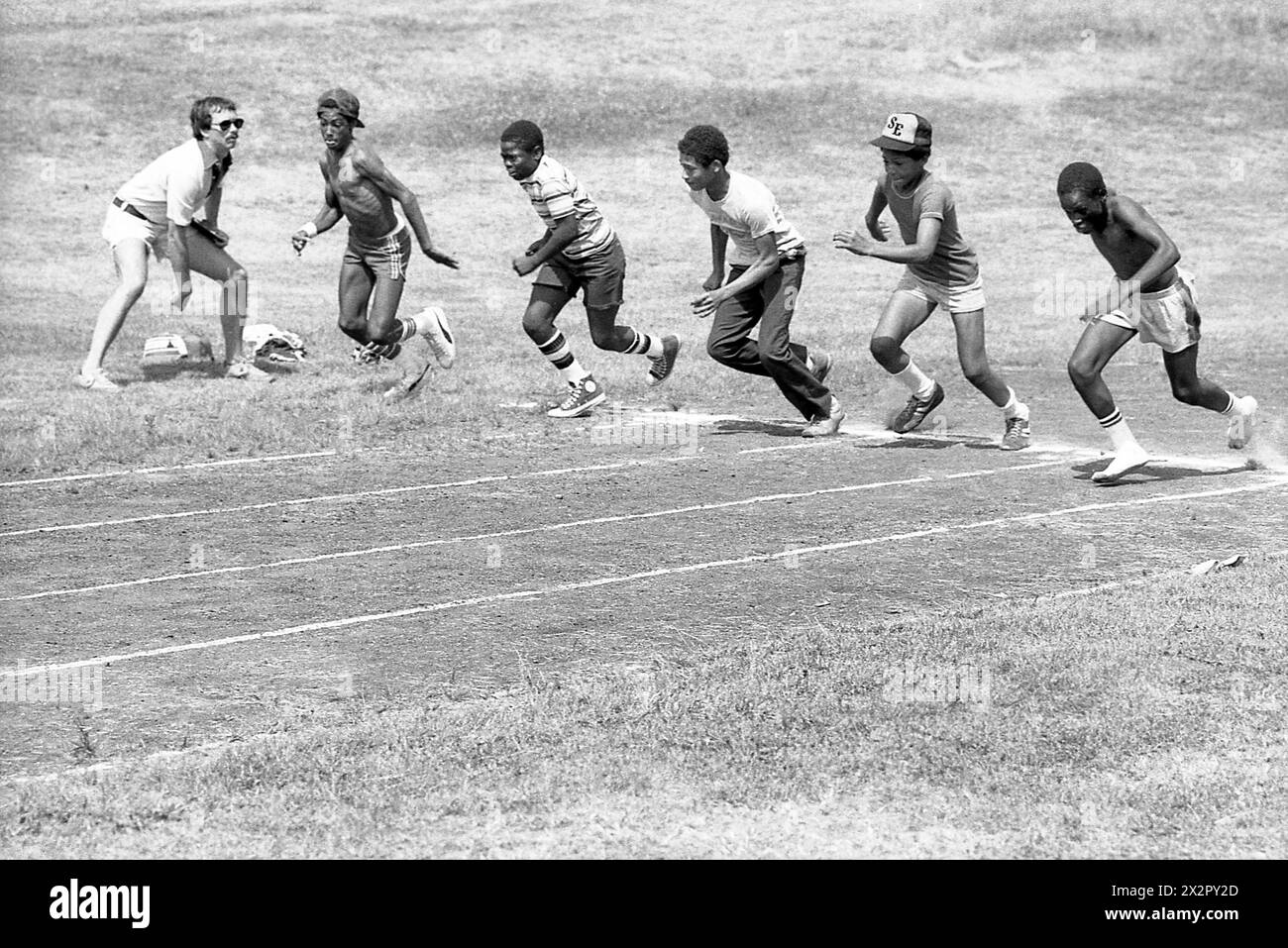 Connecticut, U.S.A., 1982. Children training for track and field. Stock Photo
