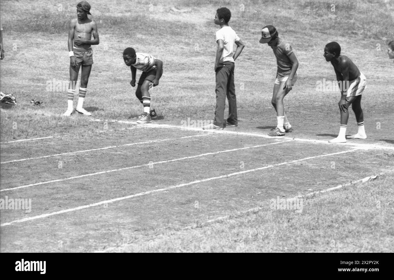 Connecticut, U.S.A., 1982. Children training for track and field. Stock Photo