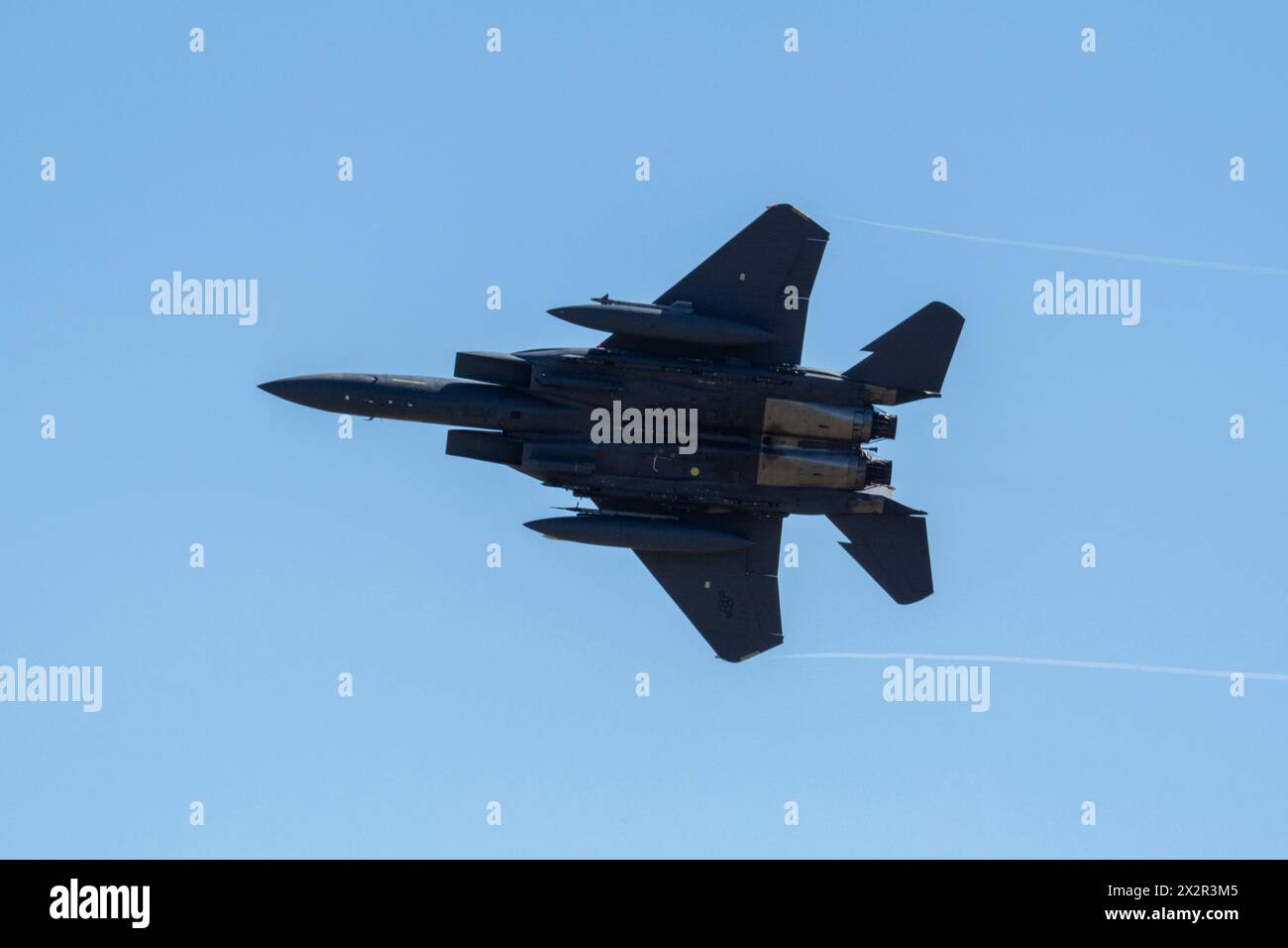 An F-15E Strike Eagle assigned to the 389th Fighter Squadron performs a simulated air strike during exercise Appaloosa Sun at Saylor Creek Range, Idah Stock Photo