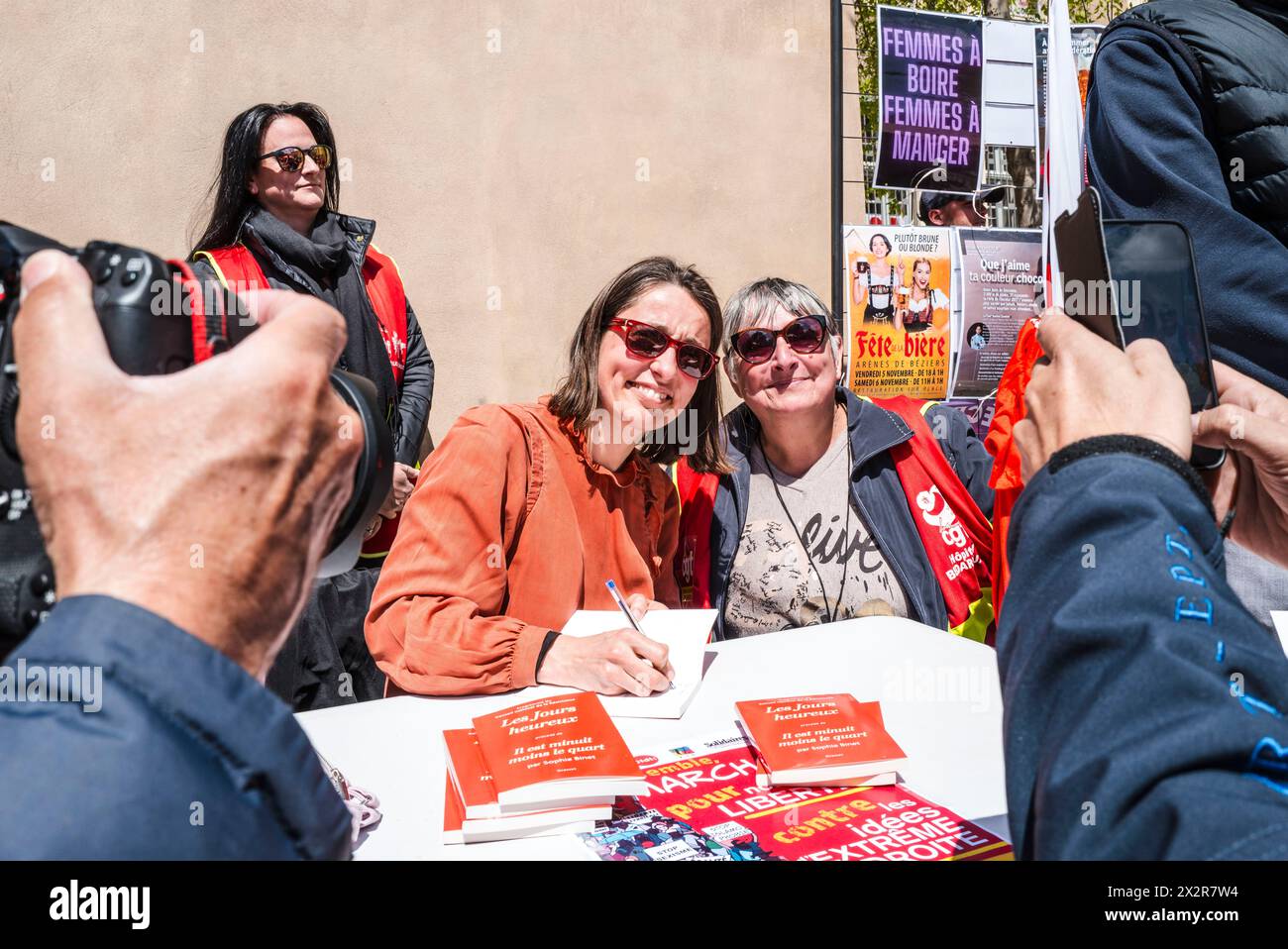 Portrait of Sophie Binet at the signing of her book, Les jours heureux, with activists. Unity march for our freedoms and against far-right ideas, in the presence of Sophie Binet, organized in Beziers by unions and associations. France, Beziers April 23, 2024.  Photograph by Patricia Huchot-Boissier / Collectif DyF. Stock Photo