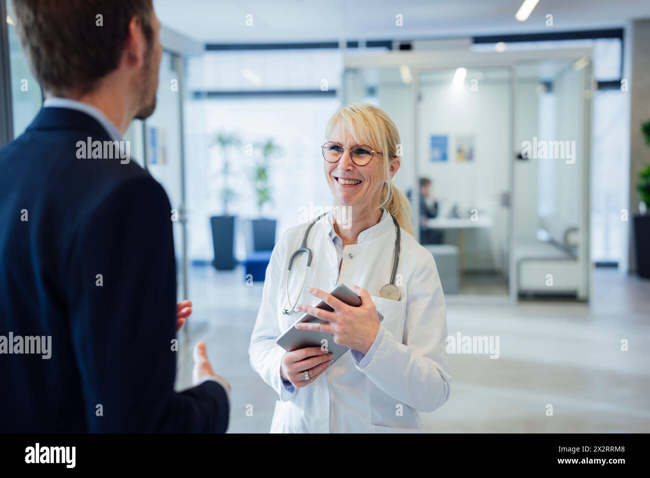 Mature man and doctor hi-res stock photography and images - Alamy