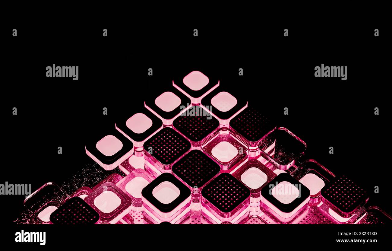 Black computer chips illuminated with pink light Stock Photo