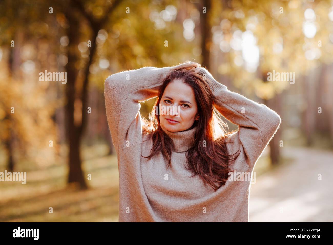 Smiling mature woman long hair hi-res stock photography and images - Alamy