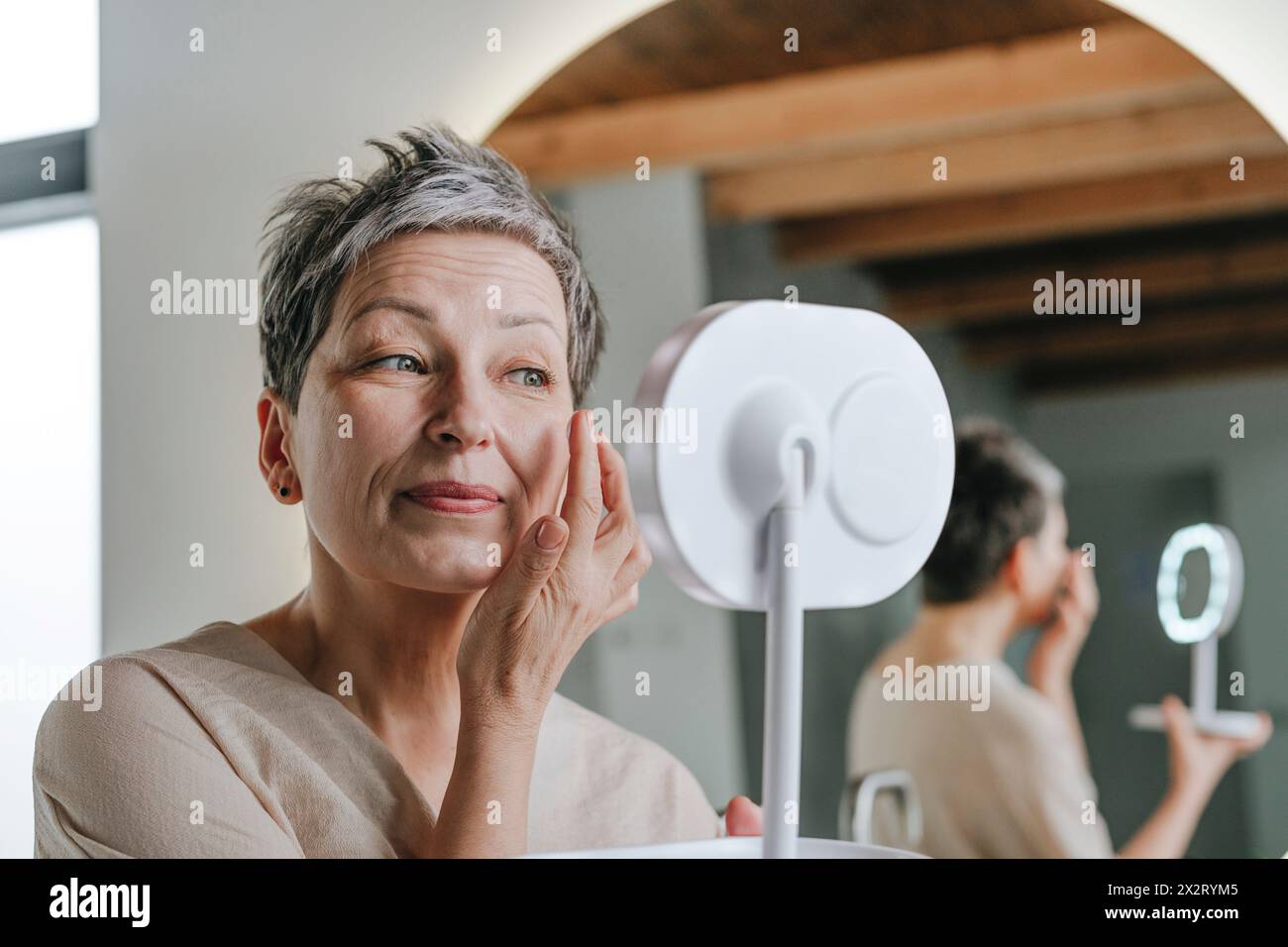 Hand mirror mature woman hi-res stock photography and images - Alamy