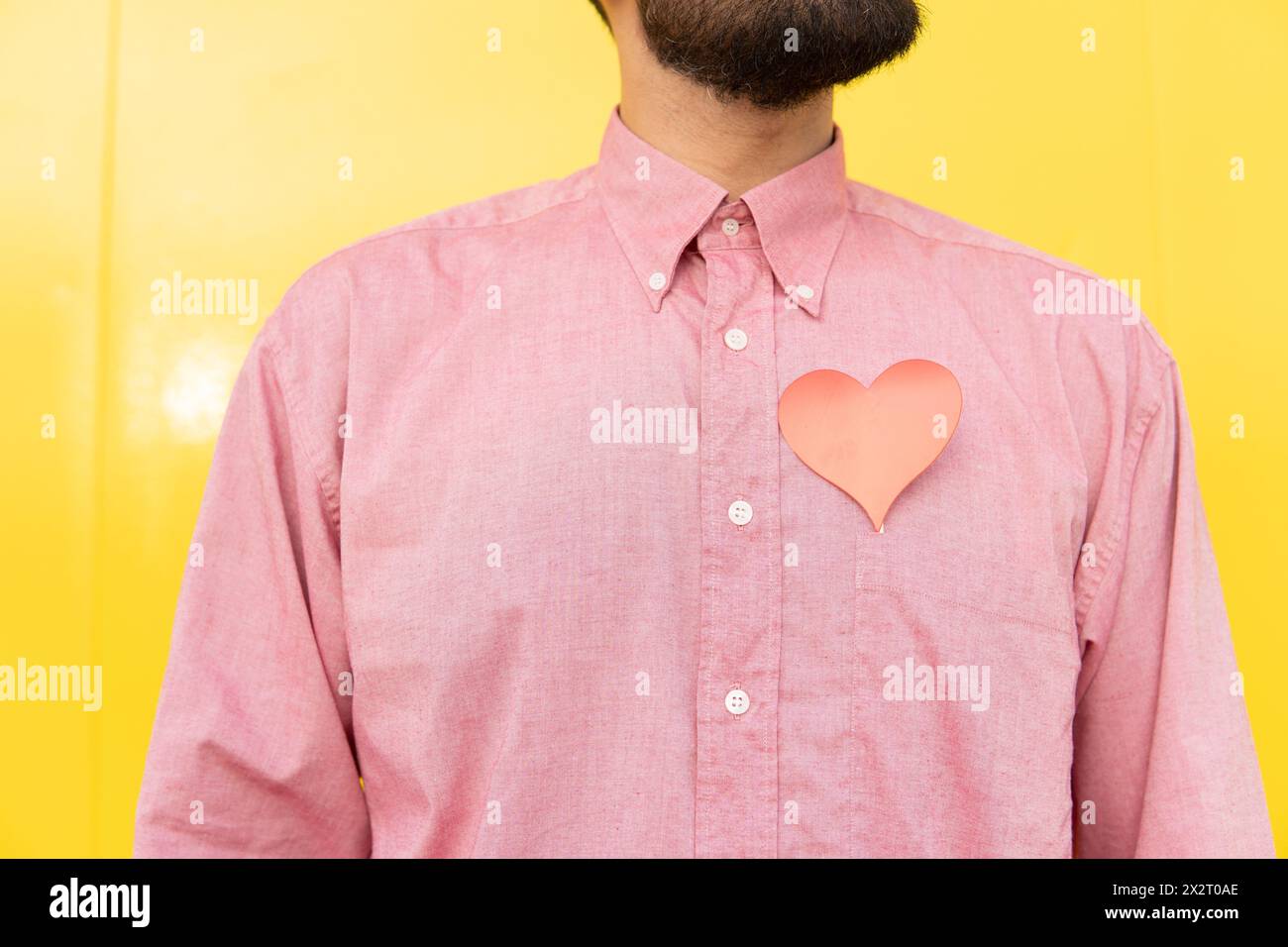 Man in pink shirt hi-res stock photography and images - Alamy