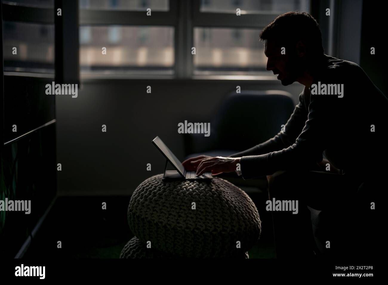 Mature businessman working on tablet PC Stock Photo