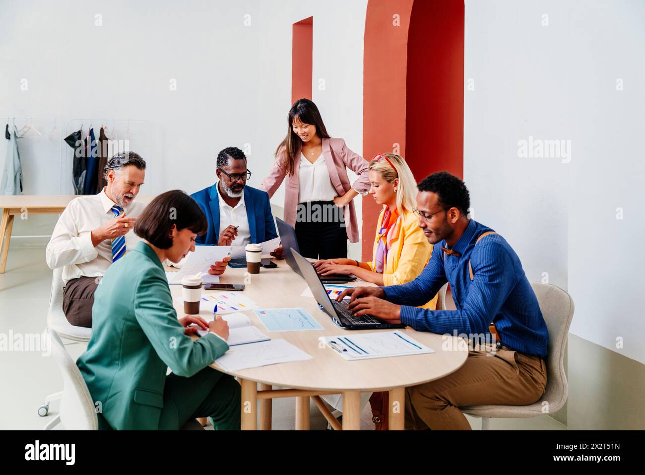 Multi-ethnic corporate business team at work place Stock Photo