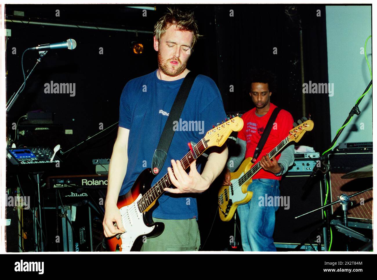 GUY GARVEY, ELBOW, YOUNG, 2001: A young Guy Garvey of the British rock band Elbow playing live with their debut album 'Asleep In The Back' at Clwb Ifor Bach (The Welsh Club) in Cardiff, Wales, UK on 6 May 2001. Photograph: Rob Watkins. INFO: Elbow, a British rock band formed in 1997 in Manchester, captivates audiences with their emotive lyrics and anthemic melodies. Hits like 'One Day Like This' showcase their distinctive sound, earning them critical acclaim and a dedicated fan base worldwide. Stock Photo